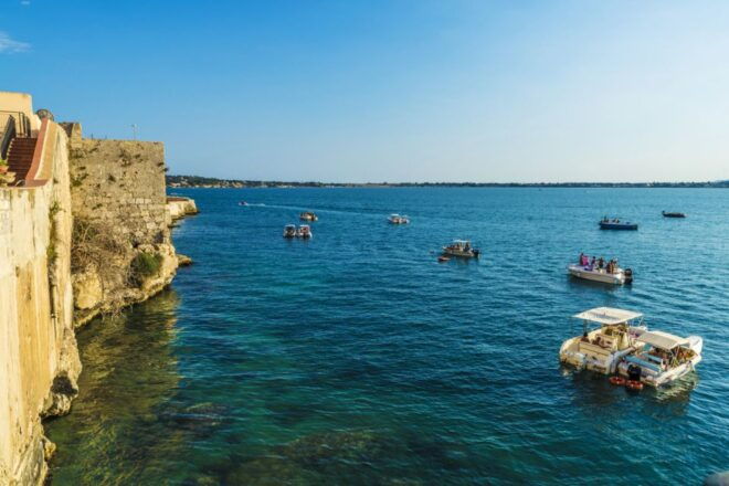 Sunset Boat Tour of Ortigia Island and Marine Caves - Inclusions