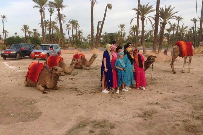 Sunset Camel Ride In Marrakech Palm Grove - Traditional Attire and Cultural Experience
