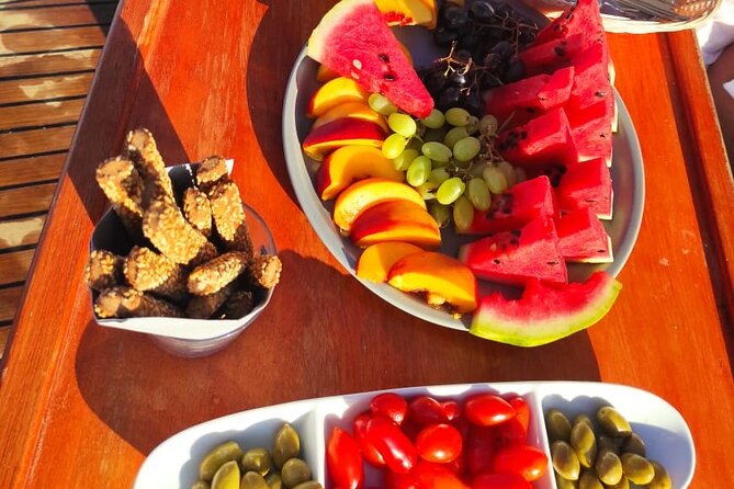 Sunset Cruise to Delos & Rhenia Islands, Fingerfood& Free Drinks - The Sum Up