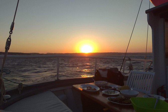 Sunset Cruise With a Swimming Stop at Kalithea Bay - Return and The Sum Up