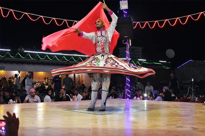 Sunset Desert Safari With Belly Dance & BBQ Dinner - Ride Camels and Try Sandboarding