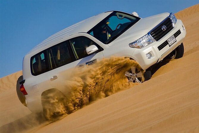 Sunset Desert Safari With Camel Riding and Sand Boarding - Thrilling Desert Dune Bashing Experience