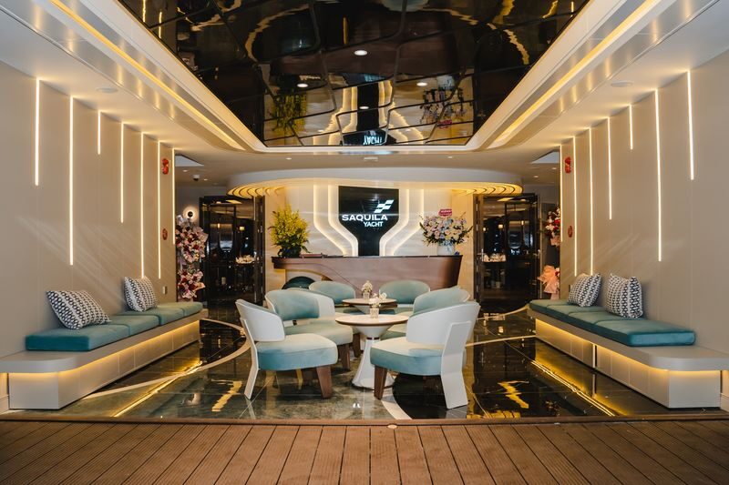 Sunset Dinner Experience of Ha Long Bay by Saquila Yacht - Ha Long’s illuminated shoreline