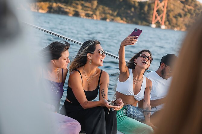 Sunset Experience- Boat Ride Through Lisbon With Music and a Drink - Boat Ride Through Lisbon