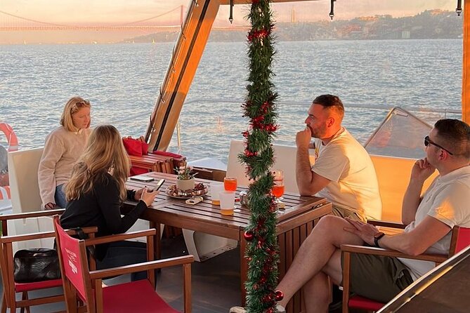 Sunset Experience- Boat Ride Through Lisbon With Music and a Drink - Music and Drinks Included