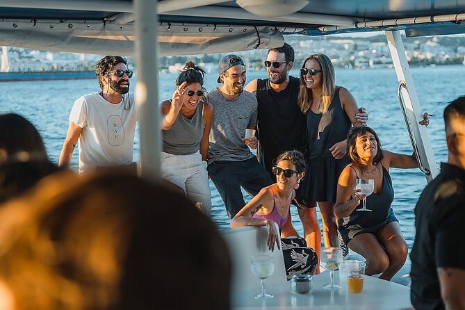 Sunset Experience- Boat Ride Through Lisbon With Music and a Drink - Beautiful Views of the City