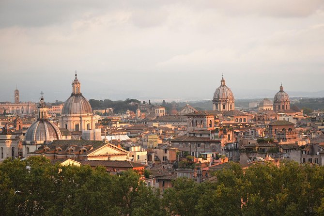 Sunset in Rome Sightseeing and Piazzas With Appetizer - Enjoy a Spectacular Sunset Over Romes Iconic Landmarks