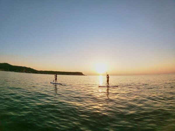 SUNSET PADDLE SURF TOUR IN THE BEST MAGIC PLACES - Price and Duration