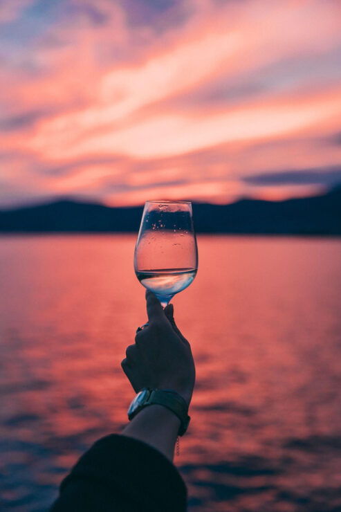 Sunset Panoramic Cruise With Drinks and Nighttime Dip - Experience and Itinerary