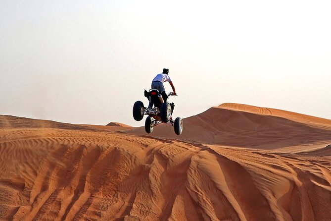 Sunset Quad Bike Safari With Camel Trek, Live Shows and Dinner - Cancellation Policy and Reviews