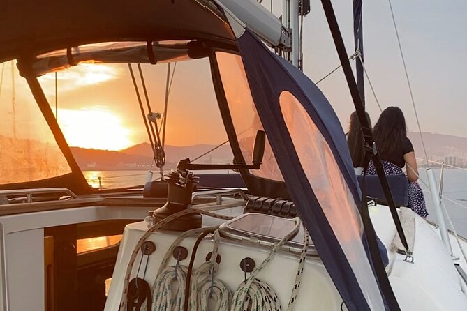 Sunset Sailboat Tour Along the Coast With Open Bar - Tour Highlights