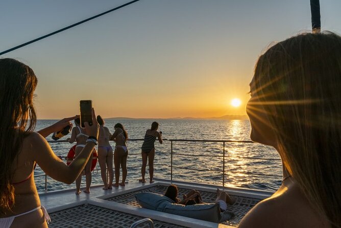 Sunset Sailing Catamaran With BBQ Along the Coasts of Mallorca - Meeting and Pickup