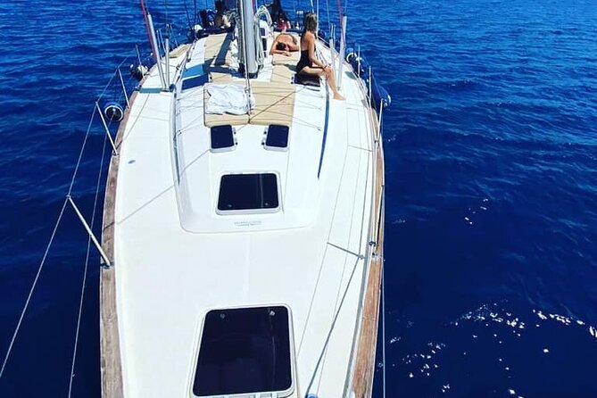 Sunset Tour With Nadia K to Delos and Rhenia Island From Mykonos - Itinerary Breakdown