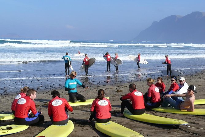 Surf Class in Famara 9:15-12:00 or 11:45-14:30 (2h Class) - Meeting and Pickup