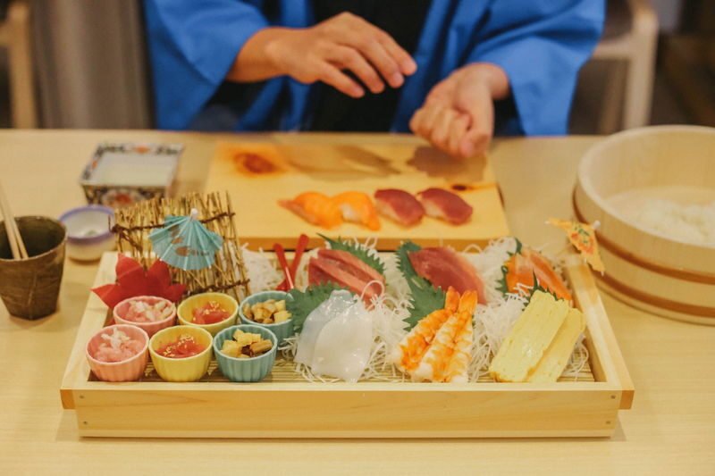 Sushi Making Class with Kimono near Tokyo Tower in Tokyo - A beginner’s first turn at the sushi counter