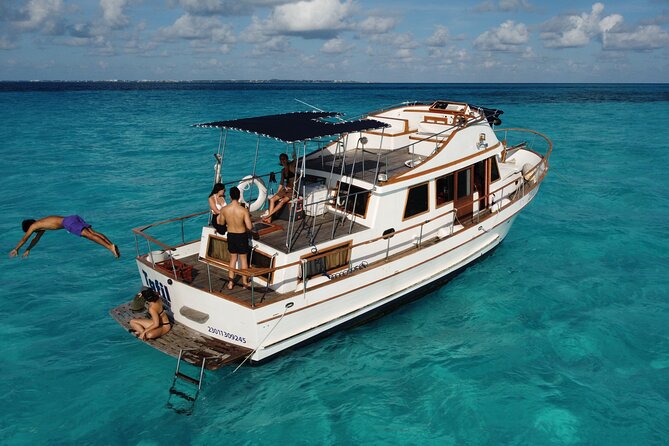Swim in Turquoise Waters and Enjoy Aboard a Classic Private Yacht Tour - Meeting and Pickup
