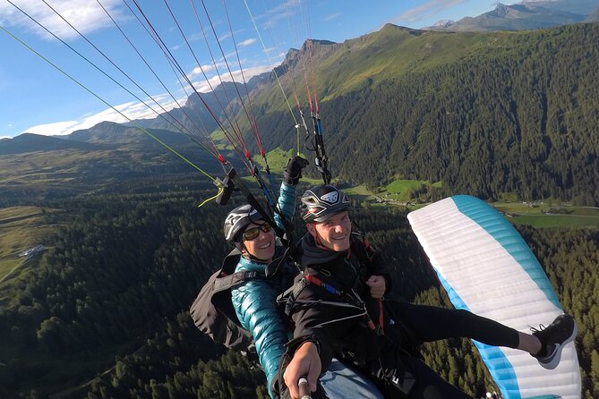 Swiss Alps Tandem Paragliding Experience in Davos - Capturing Memories: Souvenir Pictures Included