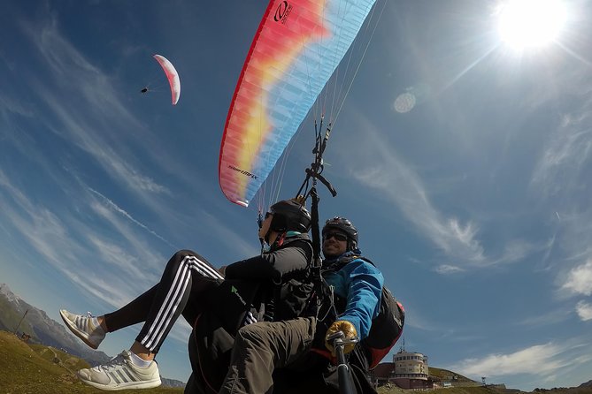 Swiss Alps Tandem Paragliding Experience in Davos - Cancellation Policy and Reviews