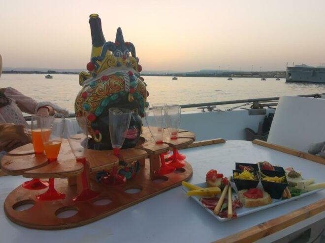 Syracuse: Ortigia Sunset Cruise With Aperitif - Duration and Languages