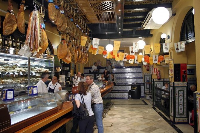 Tapas and Wine Tasting Tour in Seville Small Groups and Jewish Quarter - Tapas and Spanish Cuisine
