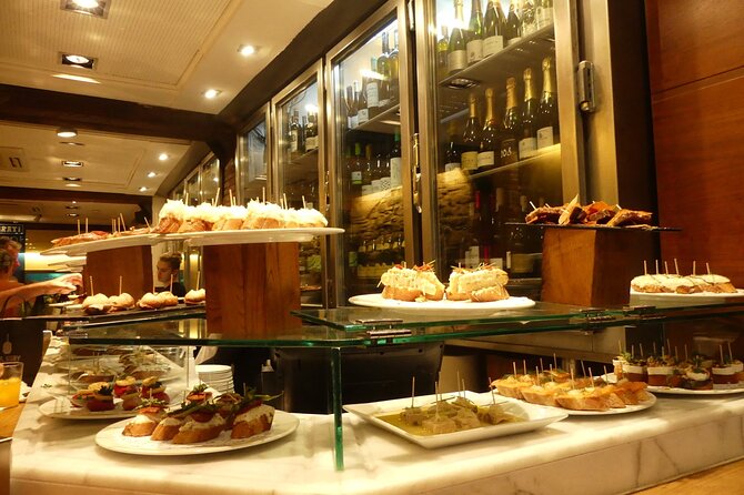 Tapas and Wine Walking Tour in Barcelona - Exploring Barcelonas Neighborhoods