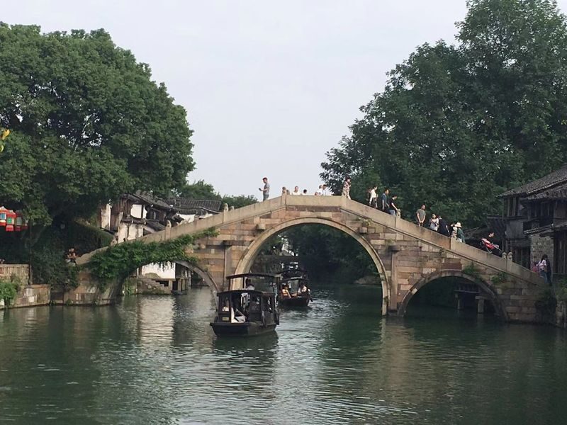 Taste Jiangnan: Hangzhou + Wuzhen 2-Day Tour - Day 2: West Lake by boat, then up Leifeng Pagoda