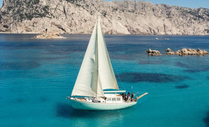 TAVOLARA TOUR WITH 15 METERS VINTAGE SAILBOAT WITH APERITIF - Breaking Down the Itinerary: What You Can Expect