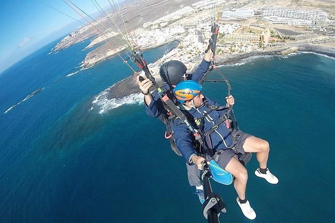 Tenerife Basic Paragliding Flight Experience With Pickup - Booking Confirmation and Accessibility