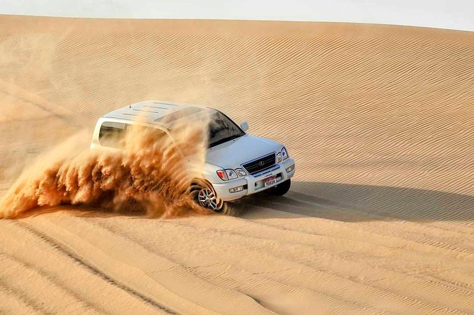The Best Dubai Desert Safari With Quad Biking & Dune Bashing & BBQ & Live Show - Overview of Dubai Desert Safari Experience