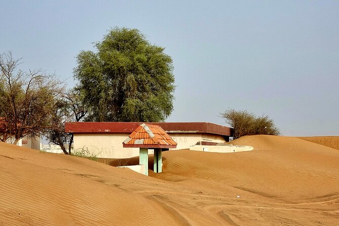 The Ghost Village Safari Tour With Dune Bashing and Sandboarding - Inclusions