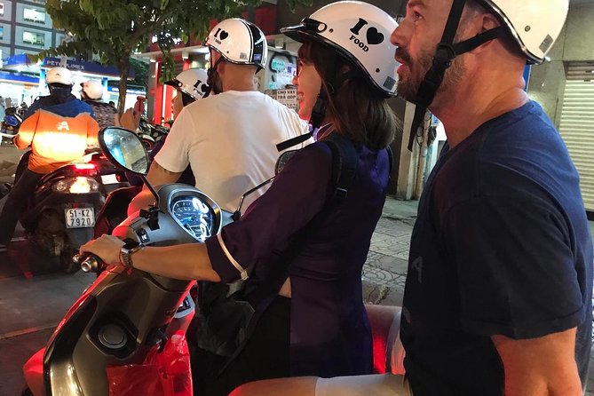 The Unique Ao Dai Street Food Tour By Scooter - Traveler Experience