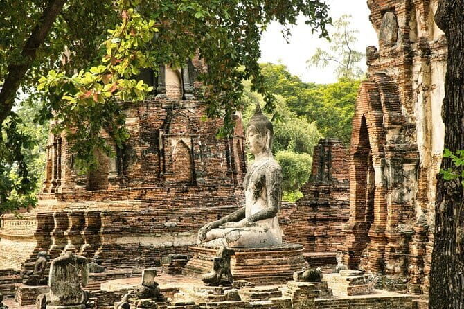Three Temple Ayutthaya Tour with Scenic Boat Ride - Discovering the Temples: A Journey Through Ayutthaya’s Past