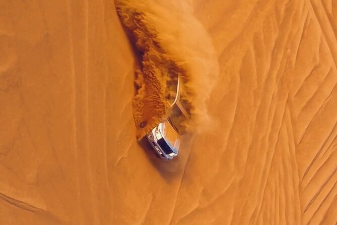 Thrilling Dune Bashing With VIP Desert Camp Delicious BBQ & Shows - The Sum Up