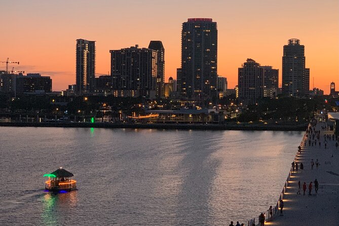 Tiki Boat - St. Pete Pier - The Only Authentic Floating Tiki Bar - Background