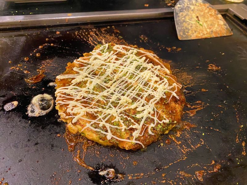 Tokyo: Asakusa Bar Hopping and Karaoke with Local Guide - First stop: monjayaki at Kōmiya