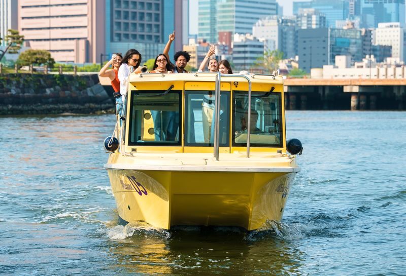 Tokyo: Sunset Boat Cruise with Local Guide on Private Boat - Sunset light, with a weather-shaped view