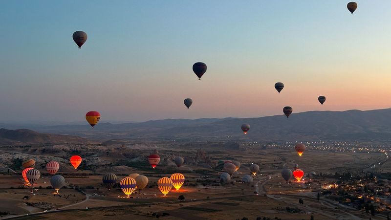 Top Hot Air Balloon Experience in Cappadocia with Hotel Transfers - Takeoff, flight, and the view below
