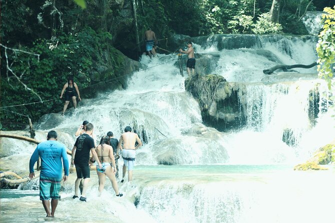 Tour to Copalitilla Magical Waterfalls From Huatulco With Admission Included - Cancellation Policy and Weather Requirements