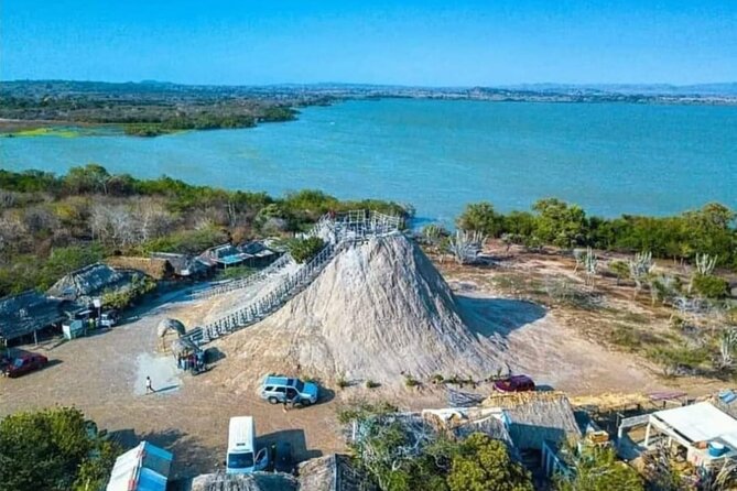 Tour to Mud Volcano With Pool and Beach With Lunch Included - Tour Itinerary Highlights