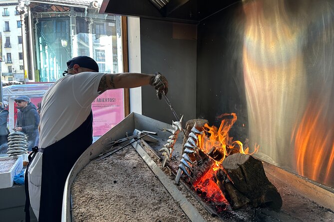 Traditional Cooking Class of Sardines With Dish Auction in Madrid - Importance of Auctions in Madrids Culinary Culture
