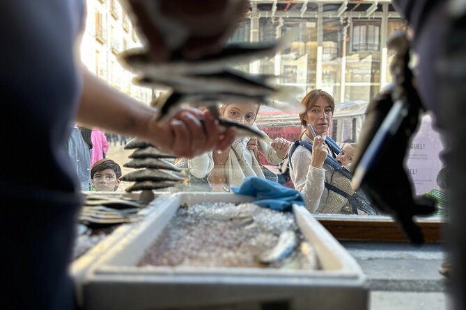 Traditional Cooking Class of Sardines With Dish Auction in Madrid - Participating in the Dish Auction Experience