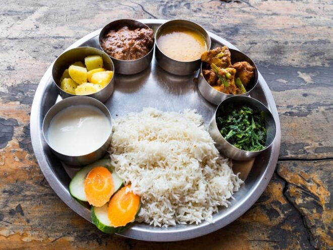 Traditional Nepali Thali Dining at AtomiX Bar and Grill - Reservation Process Details