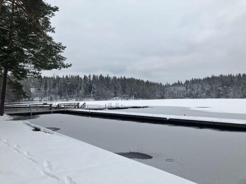 Traditional smoke sauna experience and national park visit - Cooling Off in Lake Kuusijärvi