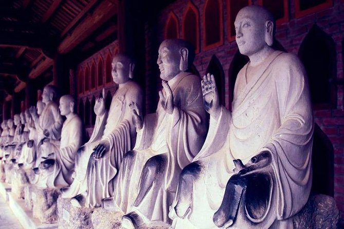 Trang an Grottoes and Bai Dinh Day Trip From Hanoi - Pricing, Availability, and Cancellation Policy