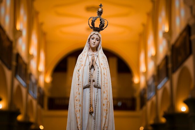 Transfer From Lisbon to Porto W/ Óbidos, Fátima and Nazaré - Private Drop Off in Lisbon