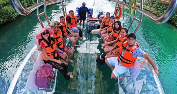 Transparent Boat Ride With Beer in Cancun - Knowledgeable Tour Guides
