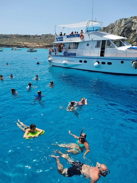 Trapani: Yacht Excursion to Levanzo and Favignana With Lunch - Onboard Amenities and Experience
