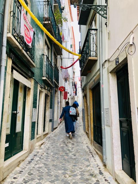 Travel to the Medieval Part of Lisbon by Tuk Tuk - The Sum Up