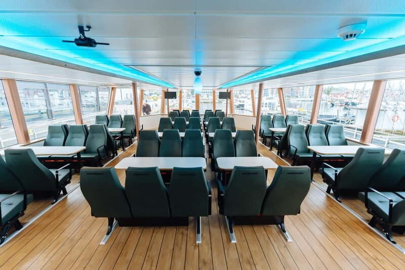 Tromsø: Whale Watching on hybrid boat with scenic bustrip - The Sum Up