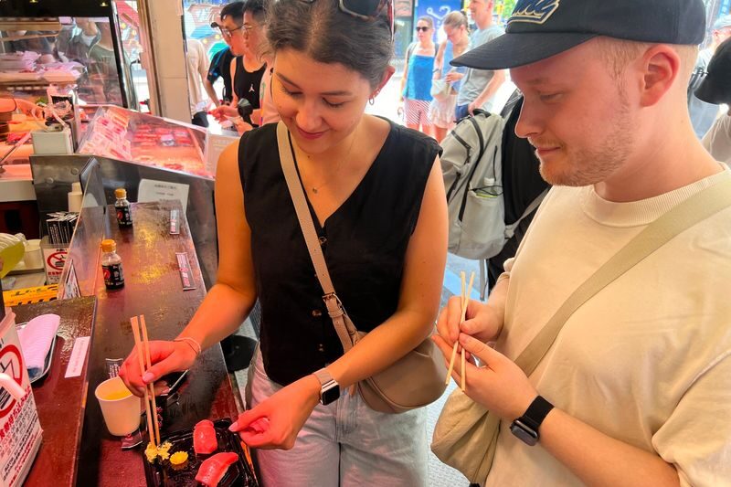 Tsukiji Fish Market Food and Walking Tour - The pace, crowds, and weather